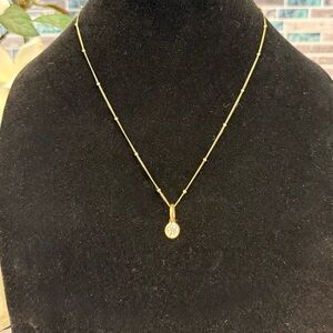 Rellery Saturn chain and Daffodil charm necklace